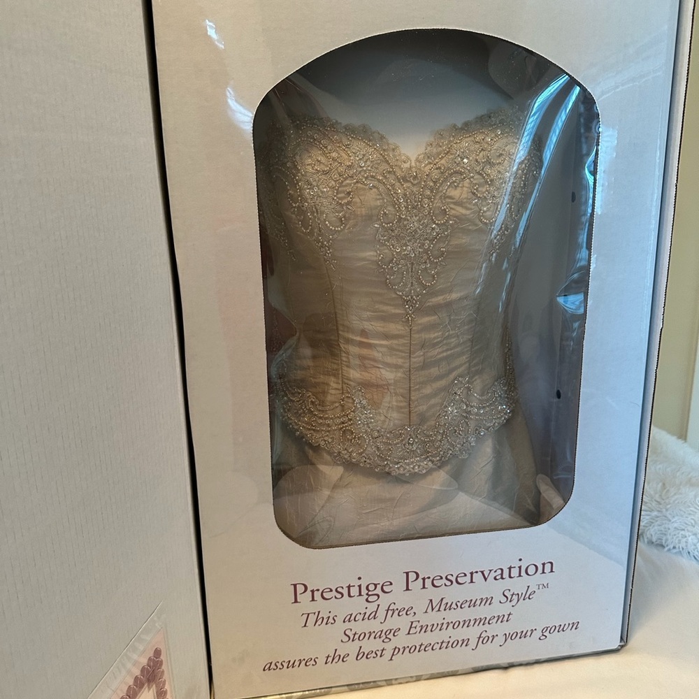 Demetrius Wedding GownWorn once, excellent condition, preserved in a box